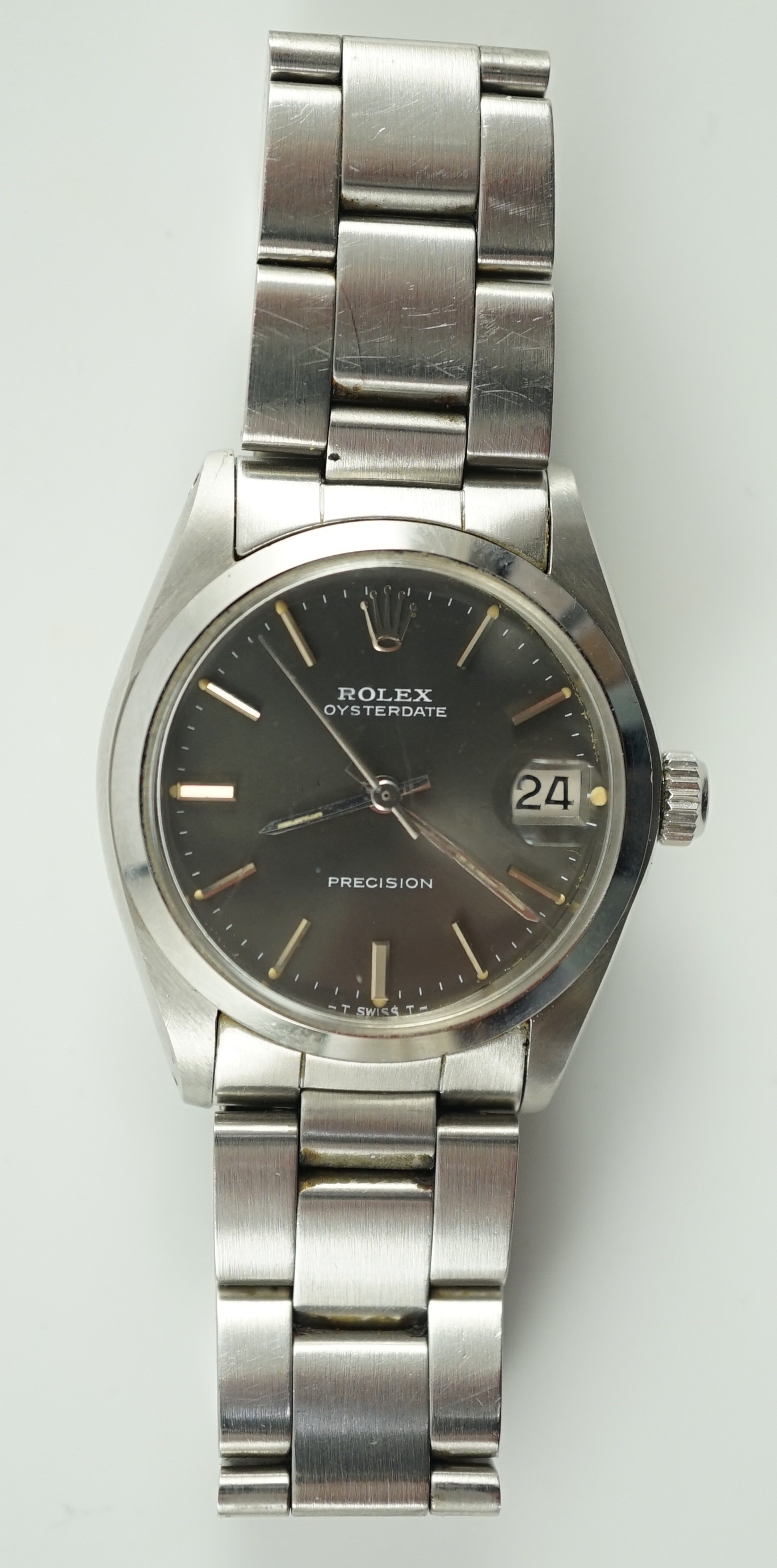 A 1980's mid-size stainless steel Rolex Oysterdate Precision manual wind wrist watch, on a stainless steel Rolex bracelet